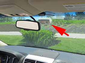 E-ZPass tag mounted to windshield